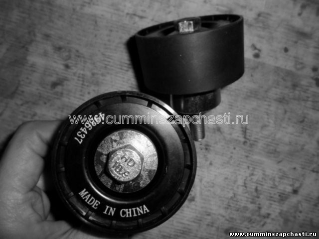 Фото 4936437 / 4936439 / 4892356 / 4891115 / 4987968 Ролик пром. ремня (ISBe,ISDe,6CT,L) гладкий [в сб] D=66.7 w=32.2 метал.